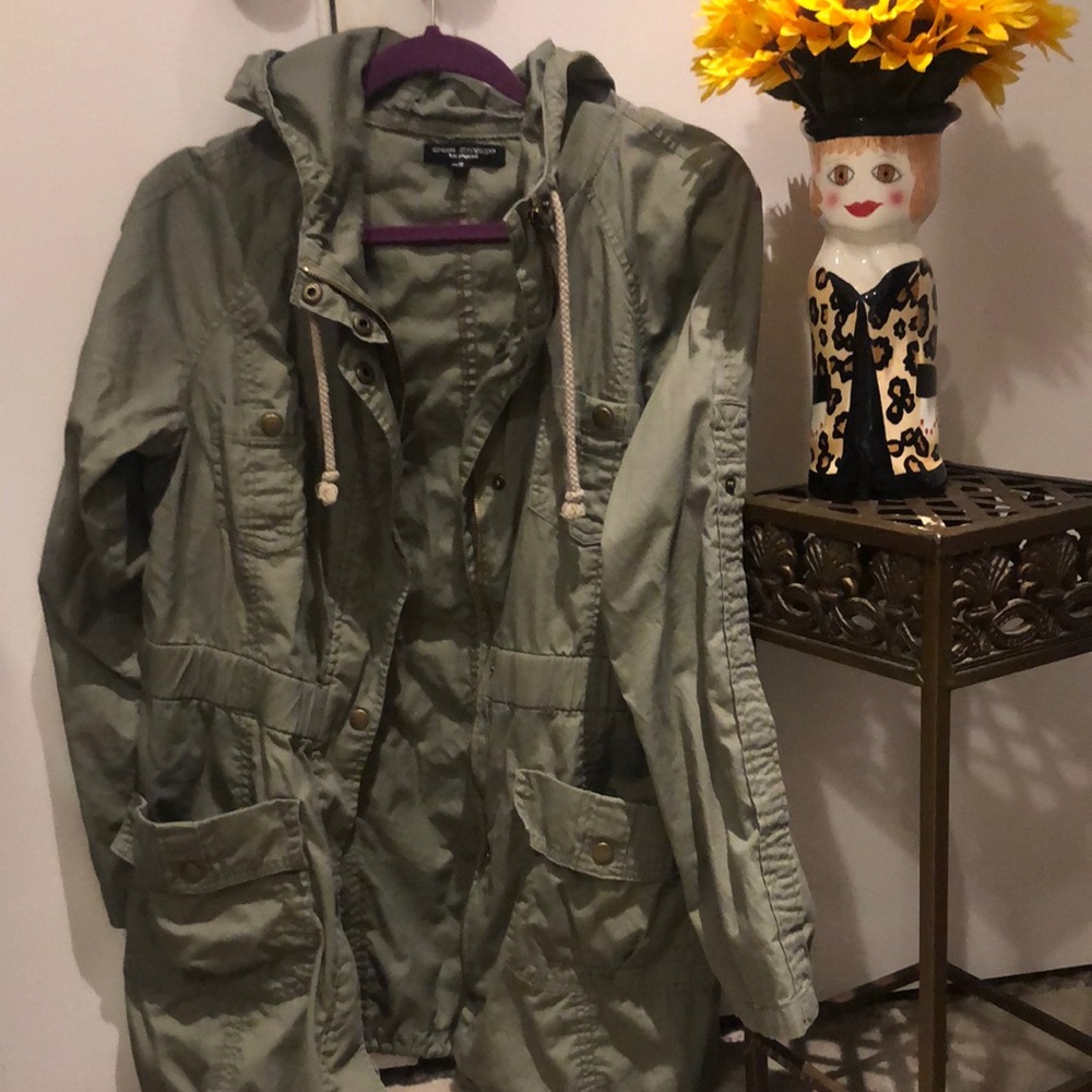 Military green jacket with hood. Full length zipper.